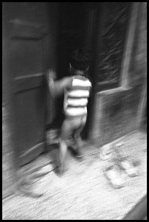 blur boy in door